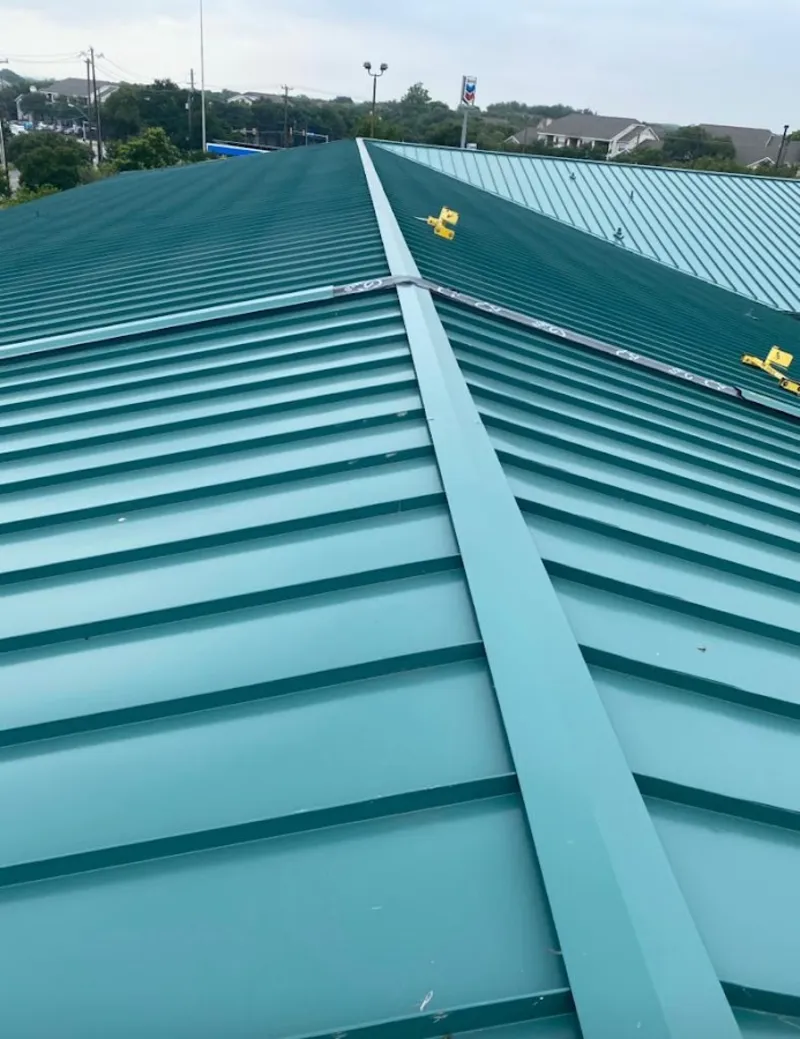 Green commercial metal roof ridge and valley for Metal Roof Repair in Dunlap